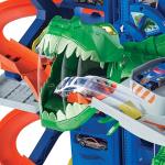 Ultimate Garage Assalto del T-Rex Robot, con 2 Macchinine incluse, Hot Wheels