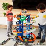 Ultimate Garage Assalto del T-Rex Robot, con 2 Macchinine incluse, Hot Wheels